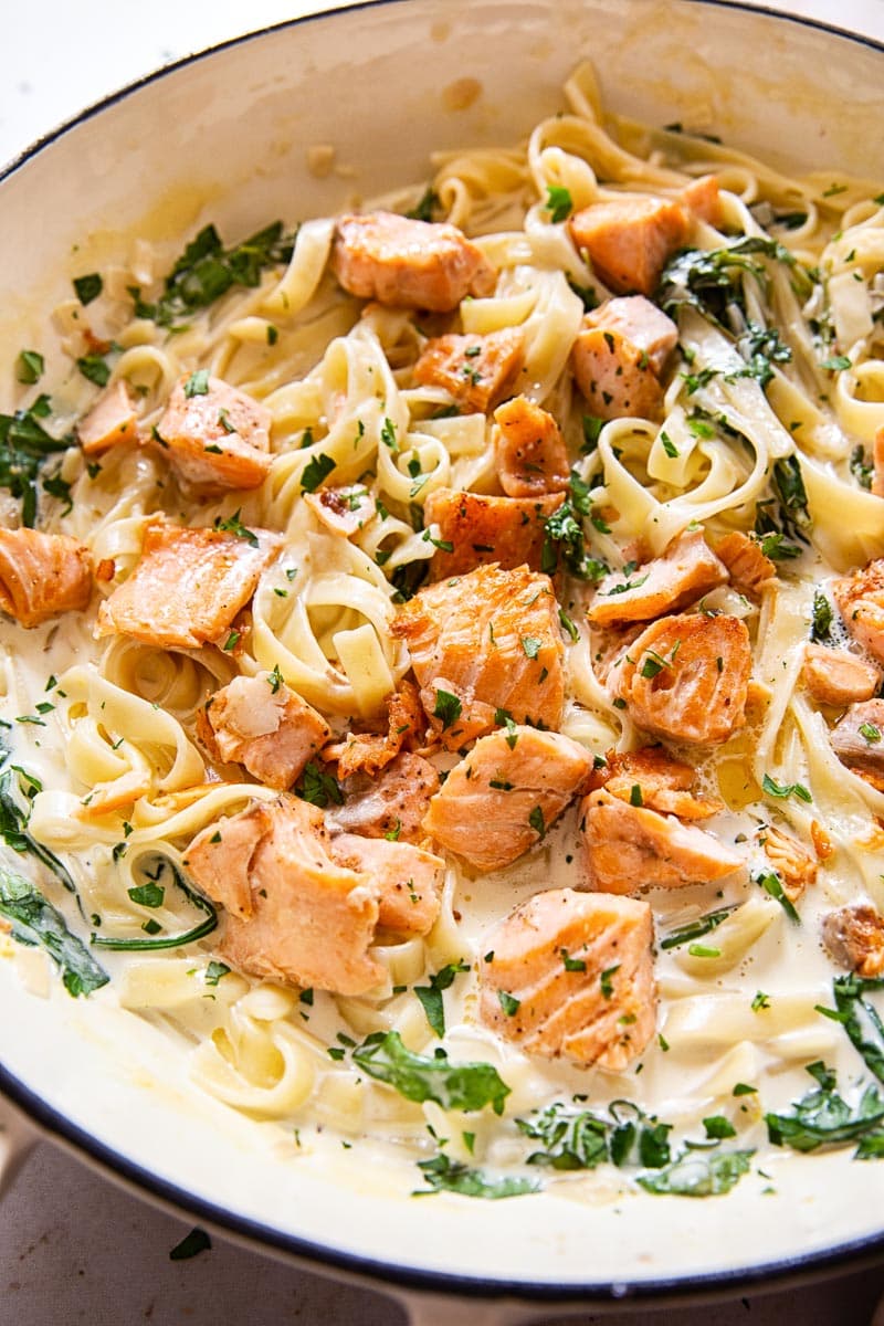 Creamy Salmon Pasta with Mixed Greens and White Wine Cream Sauce