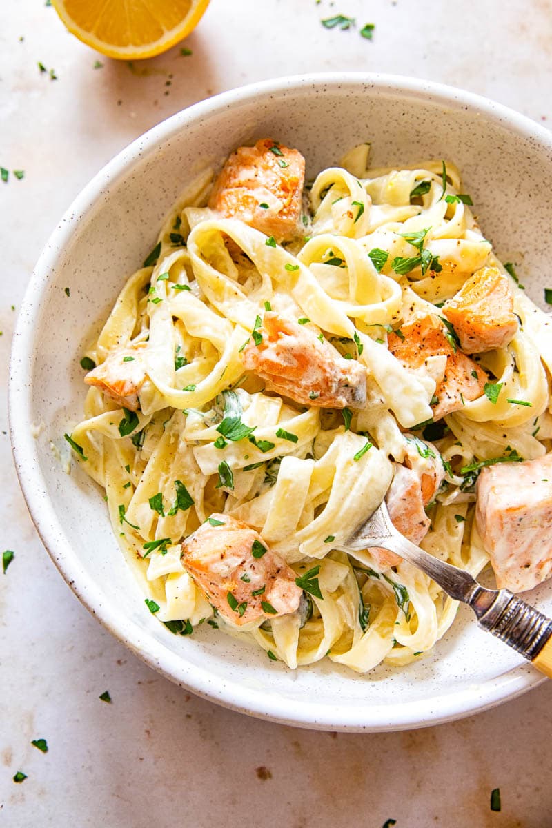 Creamy Salmon Pasta with Mixed Greens and White Wine Cream Sauce