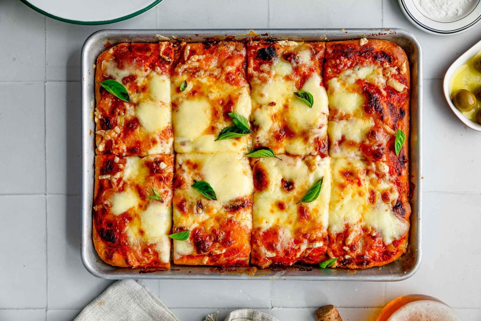 Sheet Pan Pizza With Soft Thick Crust and Fresh Basil
