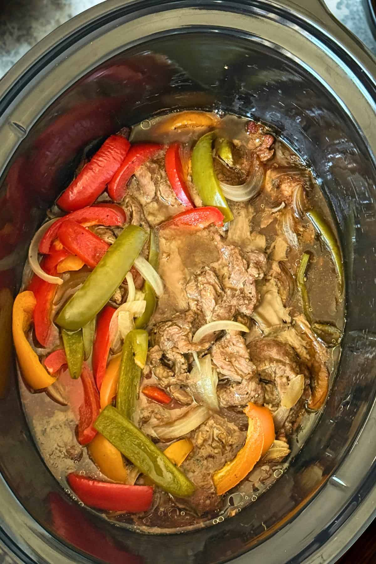 Crockpot Pepper Steak with Tender Sirloin and Savory Pepper Sauce