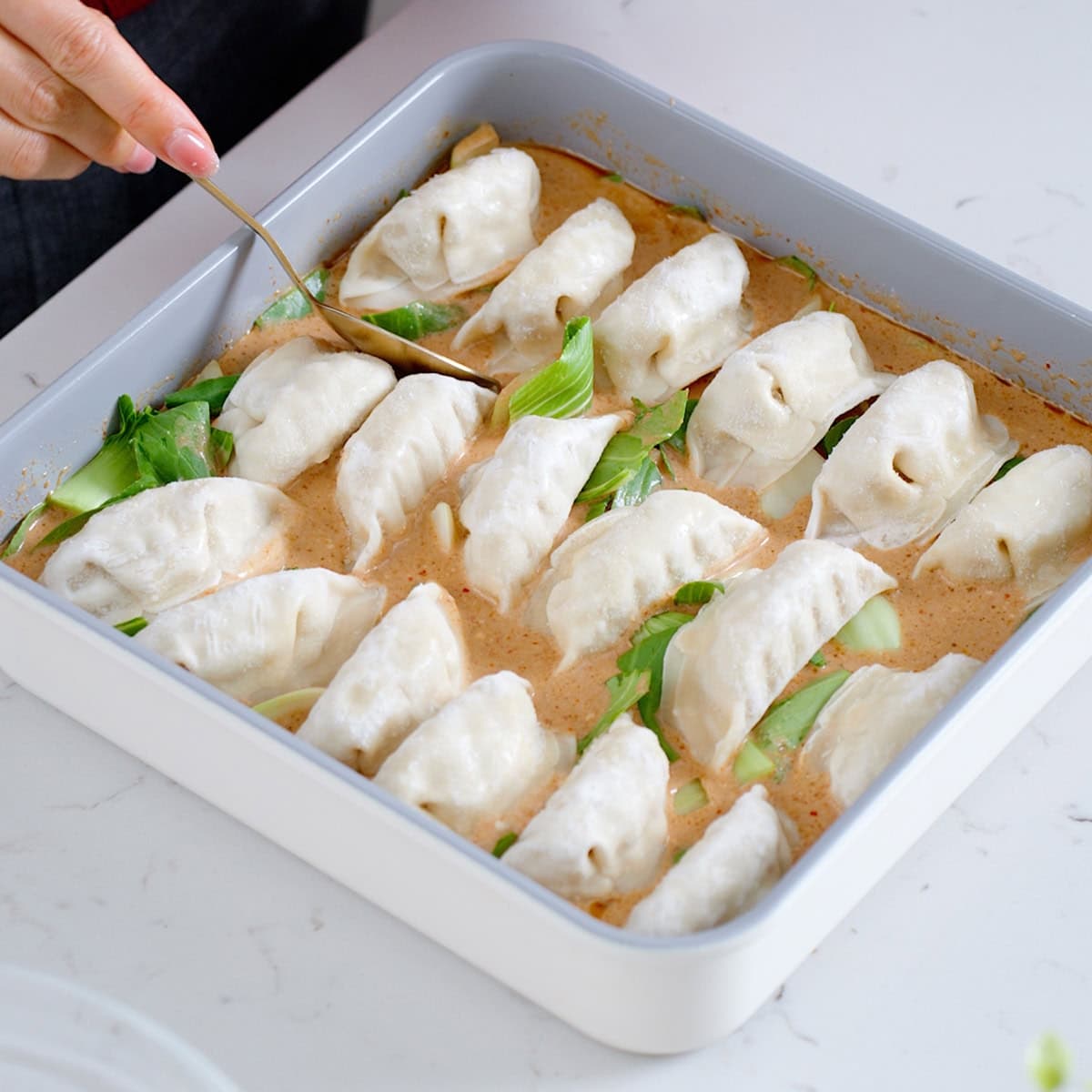 Dumpling Bake with Coconut Curry Sauce and Tender Bok Choy