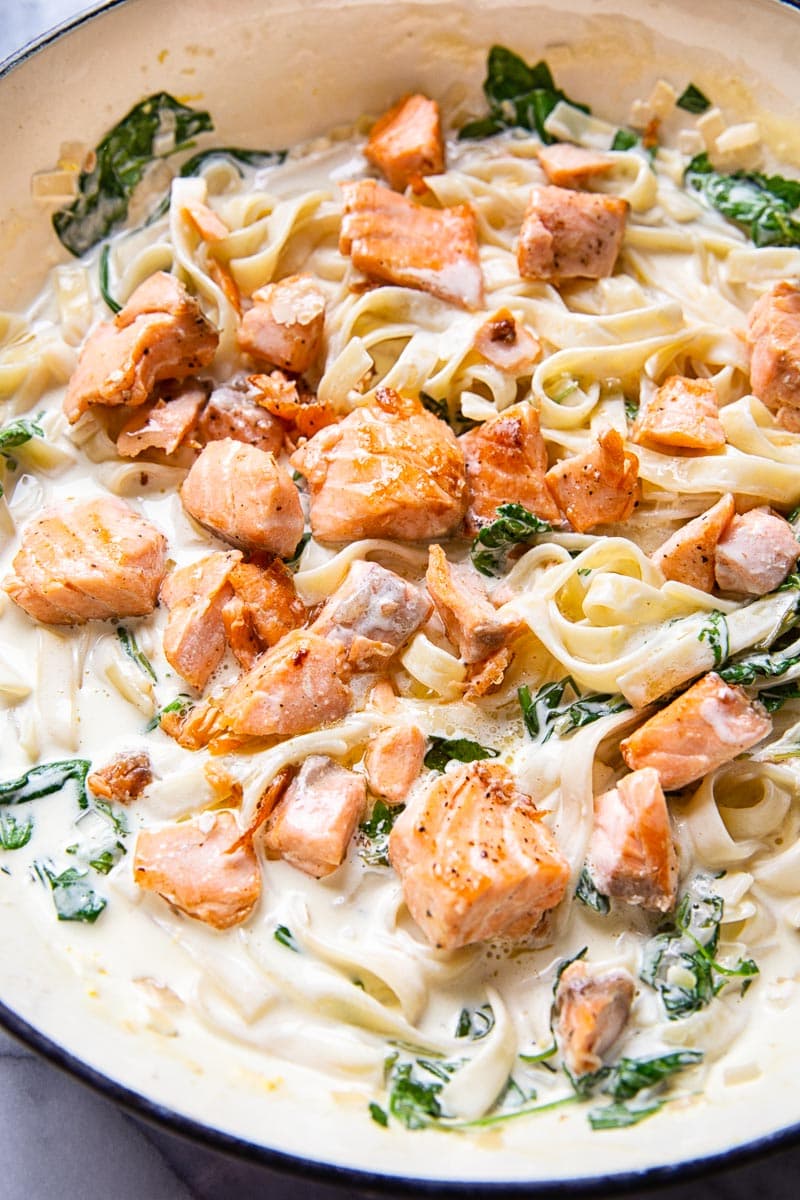 Creamy Salmon Pasta with Mixed Greens and White Wine Cream Sauce