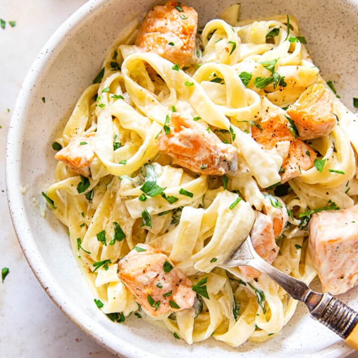 Creamy Salmon Pasta with Mixed Greens and White Wine Cream Sauce