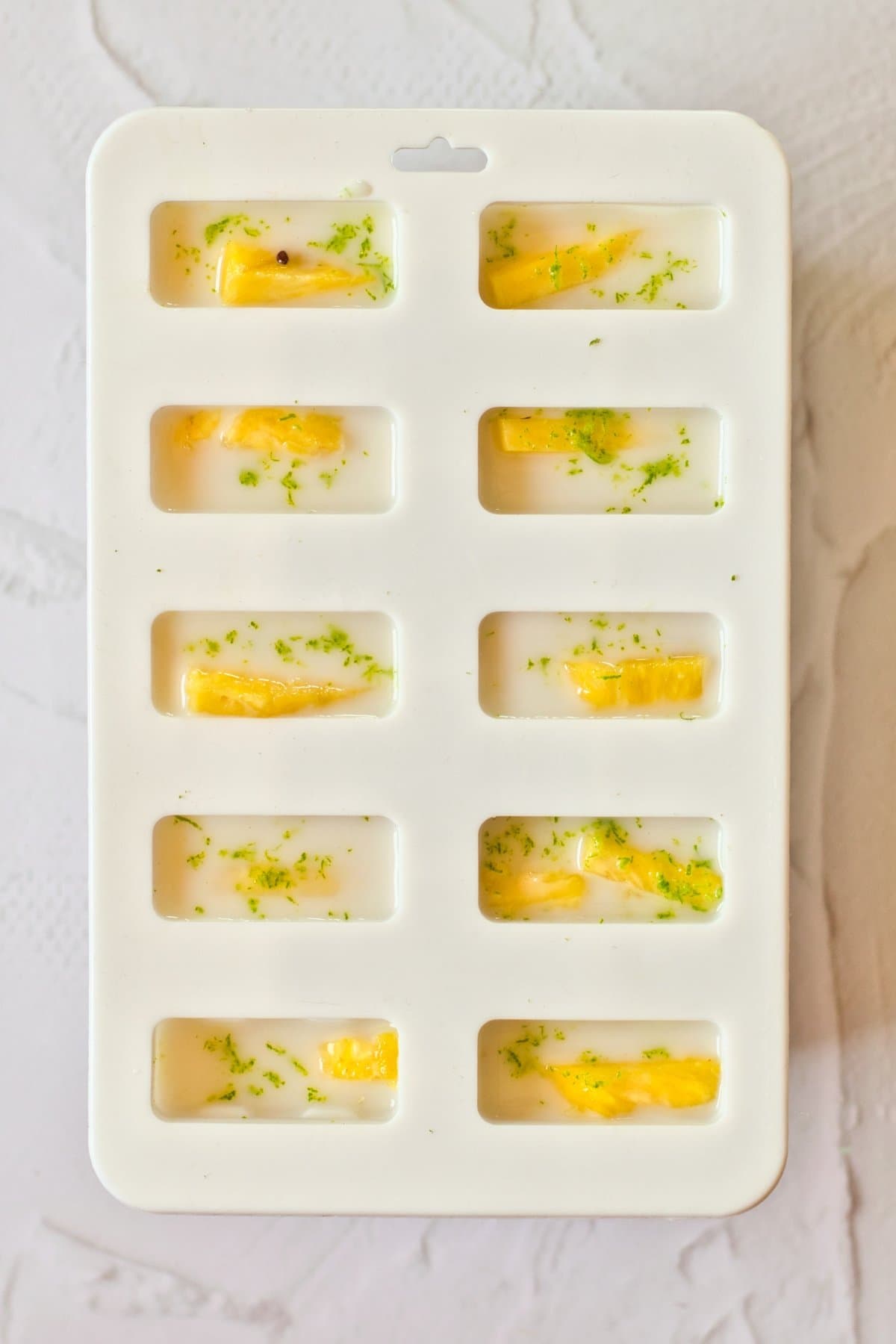 Coconut Pineapple Popsicles with Lime and Lemon