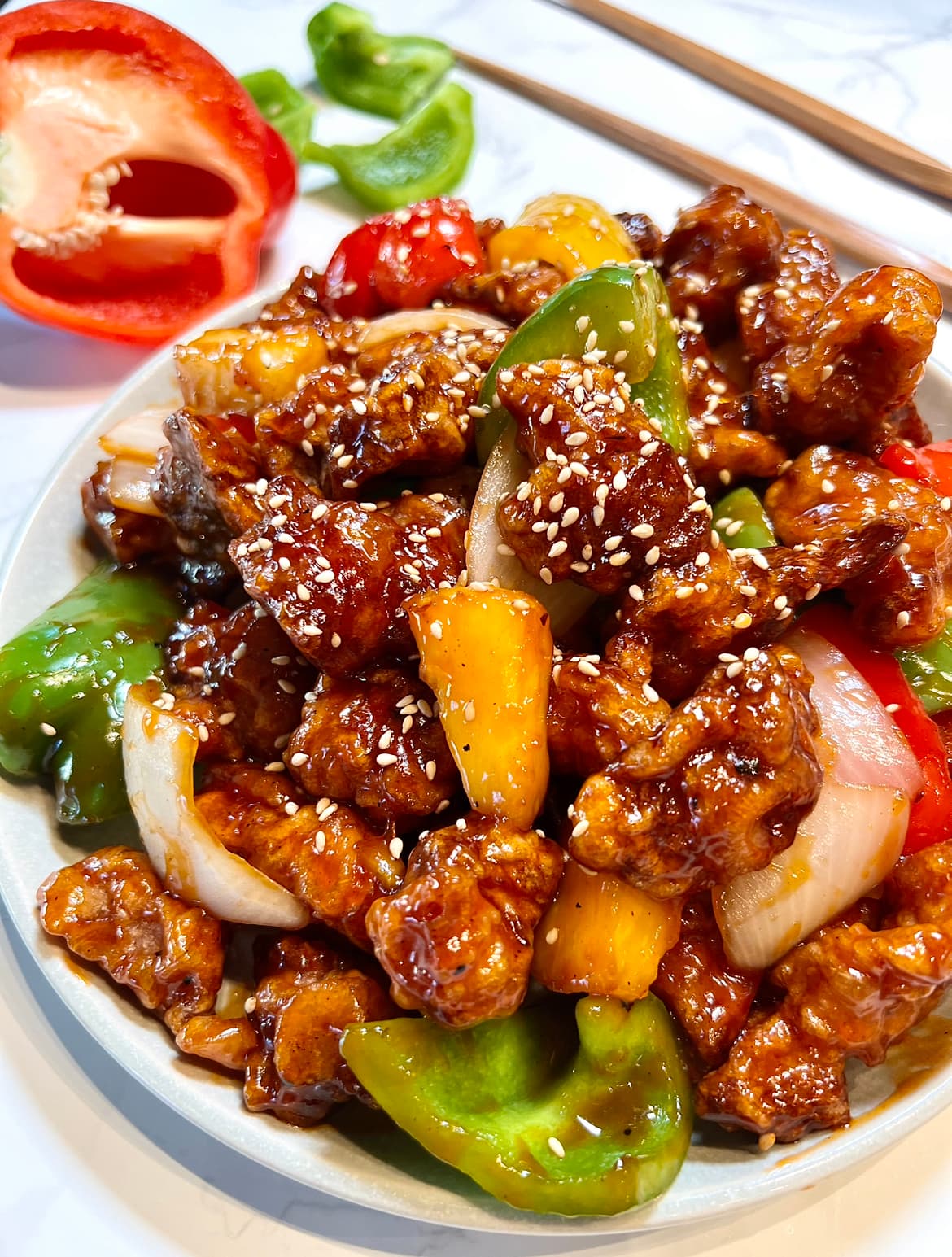 Sweet and Sour Pork with Crispy Batter and Tangy Red Sauce